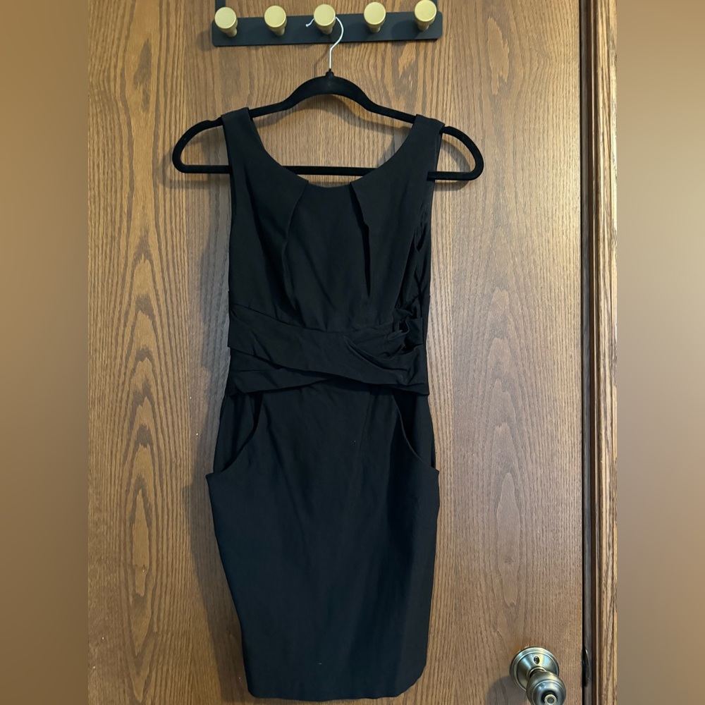 Black fitted dress.